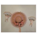 Decorative pink sun hat and fans