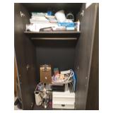 Contents of wardrobe, mostly office supplies