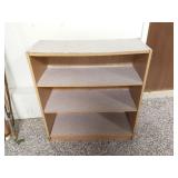 Press board book shelf