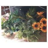 Group of fake plants under table