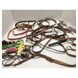 Group of purse charms, straps and handles