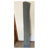 Roll of blue upolstery fabric