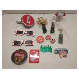 Group of Coca-Cola collectibles