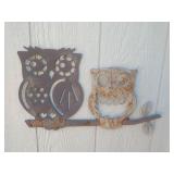 Vintage metal owl decor on shed