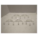 3 White cast iron coat hooks