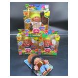 4 Troll Dolls in Original Pkgs