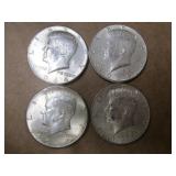 Four 1964 Kennedy Half Dollars