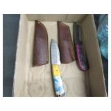 Two Knives in Sheaths - One is Damascus