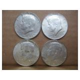 Four 1964 Kennedy Half Dollars