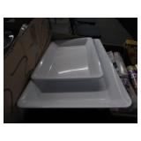 Three Plastic Trays