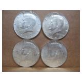 Four 1964 Kennedy Half Dollars