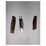 three pocket knives