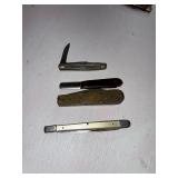 set of four pocket knives *all busted handles*