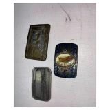 three mens belt buckles