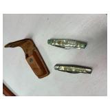 Two pocket knives with case