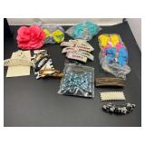 Assortment of ladies fashion barrettes and bows, see pictures for details.