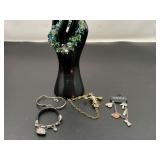 Ladies fashion estate bracelets to include a name charm bracelet, crystal stretch bracelet, leather and silvertone heart bracelet, and more. See pictures for details.