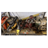 Shelf lot marked 5097 to include a Partner concrete cut-off saw, Akron Brass ground monitor/hydrant valve, small generator, and more. Working condition unknown on these items, see pictures or details.