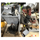 B1...Pallet lot of assorted items to include Walkaway spring clip brackets, headlights, 10/2 amp battery charger, working condition unknown, pinal hook receiver hitch, and more. See pictures for detai