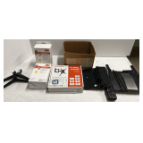 Mystery lot of assorted items to include respirators, TV mount, and more. See pictures for details.