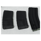 3-5.56 mm magazines, believed to be 1-30 round, and 2–20 round, tub is not included, see pictures for details.