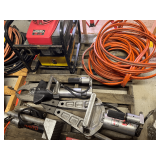 Pallet lot of assorted rescue tools to include AMKUS “Jaws of Life”, Amkus Hydraulic Extension Ram, Amkus hydraulic rescue cutter, hydraulic pump, not locked up, and hydraulic hose. Working condit
