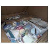 ENORMOUS PALLET SIZE BOX FILLED WITH DISASTER RELIEF HYGIENE KITS, BOXES OF PROTECTIVE OVERALLS, MOSQUITO NET CANOPY, AND MORE
