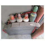 WELDING GAS TANKS AND VINYL PLANK FLOORING IN FLOOR AREA MARKED OFF AS 1080