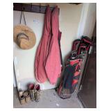 ALL ITEMS IN BACK WALL AREA MARKED 1002 INCLUDING ORLIMAR BLACK ICE GOLF CLUBS WITH BAG, ADDITIONAL GOLF CLUBS IN THE CORNER BEHIND, WORK JACKETS, AND MORE