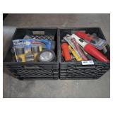 TWO MILK CRATES FILLED WITH FLASHLIGHTS