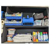 CONTENTS OF TWO UPPER SHELVES MARKED 1018 INCLUDING GOJO TOWELS, TERRY TOWELS, GLASS CLEANER, CONSTRUCTION DRY OUT BLOWER, EPOXY TUBES, AND MORE