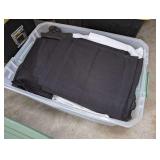 STERILITE TUB FILLED WITH BLACK AND WHITE TABLECLOTHS
