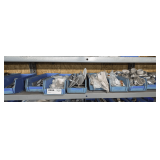 PLASTIC PARTS BINS AND CONTENTS ON SINGLE SHELF MARKED 2006 INCLUDING DOOR STOPS, BRACKETS, AND MORE
