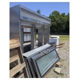 SCRAP METAL LOT INCLUDING LARGE RESTAURANT STAINLESS REFRIGERATOR BODY, STEEL WHEELBARROW, AND CLOTHES WASHER