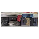 ALL LUGGAGE ON TOP SHELF MARKED 1003