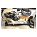 Delta 10'compound miter saw, powers up, see pictures for details.