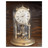 VINTAGE RETIREMENT GIFT FROM B&W HOWARD MILLER 'MARGUERITE' ANNIVERSARY CLOCK - BRASS WITH GLASS DOME CHIMES 12' TALL X 6 1/2' WIDE