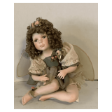 GEPPETTO PORCELAIN/BISQUE FAIRY DOLL IN SITTING POSITION 14' TALL X 7' WIDE (HAND DAMAGED)