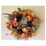 Garage… Seasonal wreath decor, also includes framed, stained glass wall decor, see pictures for details.