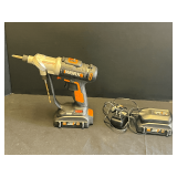 Garage…Worx Switchdriver cordless drill, comes with two batteries, and charger, does work, see pictures for details.
