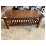 Garage…Mission-style wooden coffee table with slatted sides and bottom, see pictures for details.