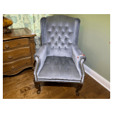 Master… Blue wing back chair with tufted back,  nail head trim, and rolled arms, see pictures for details.