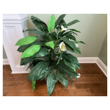 Master… Large faux peace lily plant, see pictures for details.