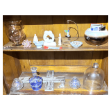 Master… Shelf lots of content of two bottom shelves marked 1084 to include a small two toned fishbowl planter, glass dome cover, small juice decanter, and more. See pictures for details. ￼
