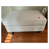 Master… Light blue upholstered ottoman, see pictures for details.