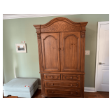 Master… Very nice double door, two piece bedroom armoire, has four drawer storage. Any items shown in pictures are sold in separate lots, see pictures for details.