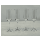 KIT… Crystal champagne flutes, set of four, tops are slightly flared, see pictures or details. ￼
