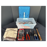 Garage… Tub of assorted hand tools to include a small screwdriver set, pliers, cutters, and more. See pictures for details.