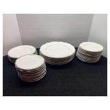 Buffalo china dishware, includes plates, salad plates, bread plates, and saucers. Approximately 25+ pieces. Comes with dish storage covers. See pictures for details.