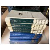 Collection of World Book Year Books, The New Book of Knowledge Volumes, and Young